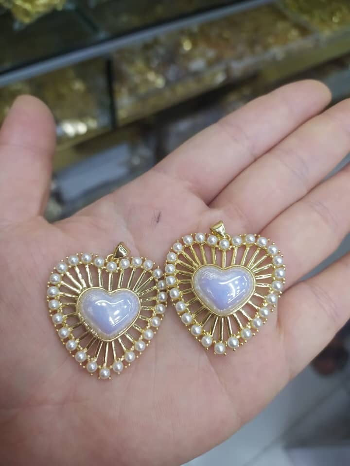 Dije de corazón blanco
