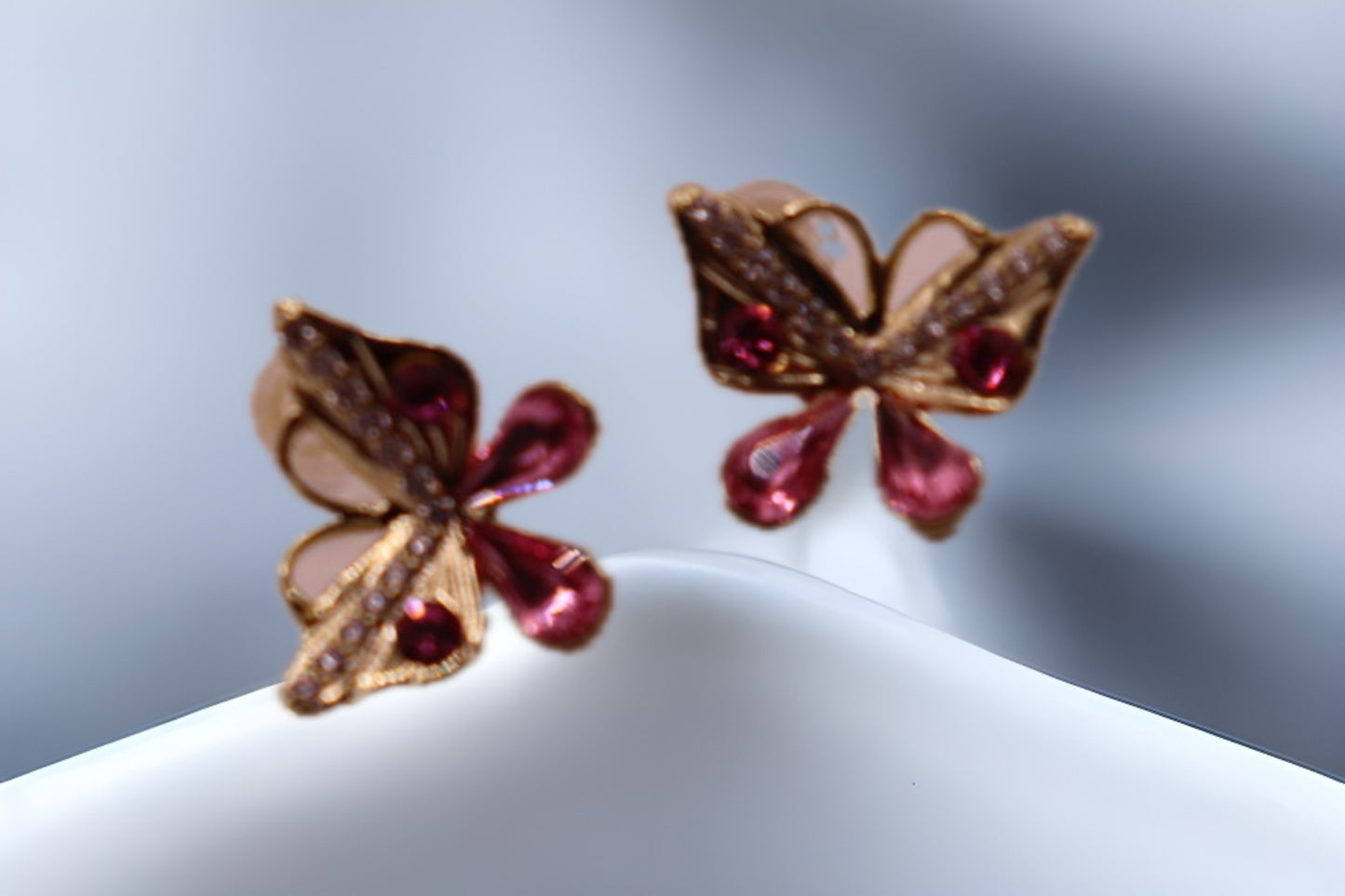 Aretes mariposa rosa